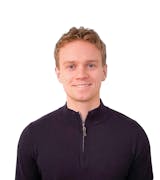 headshot of Chris similing